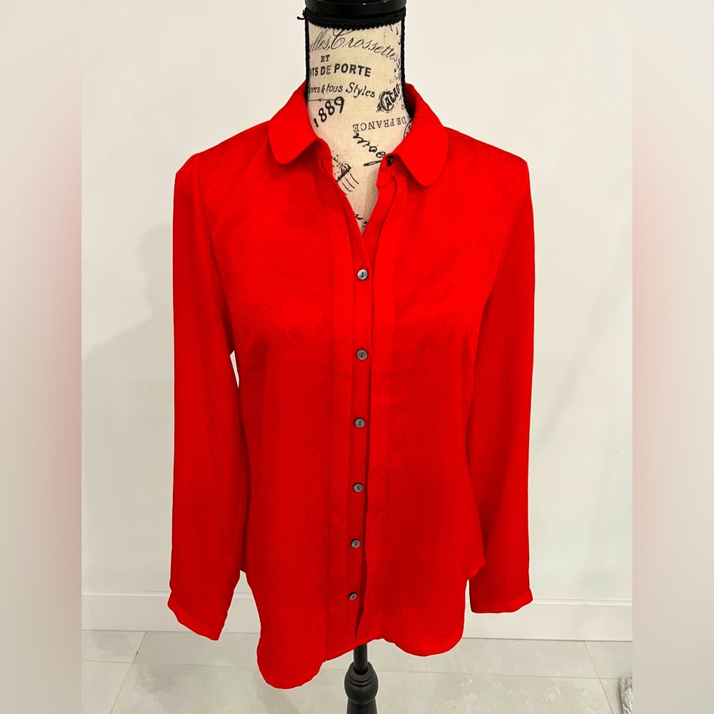 Burnt orange coral red blouse button down with snake skin print on it